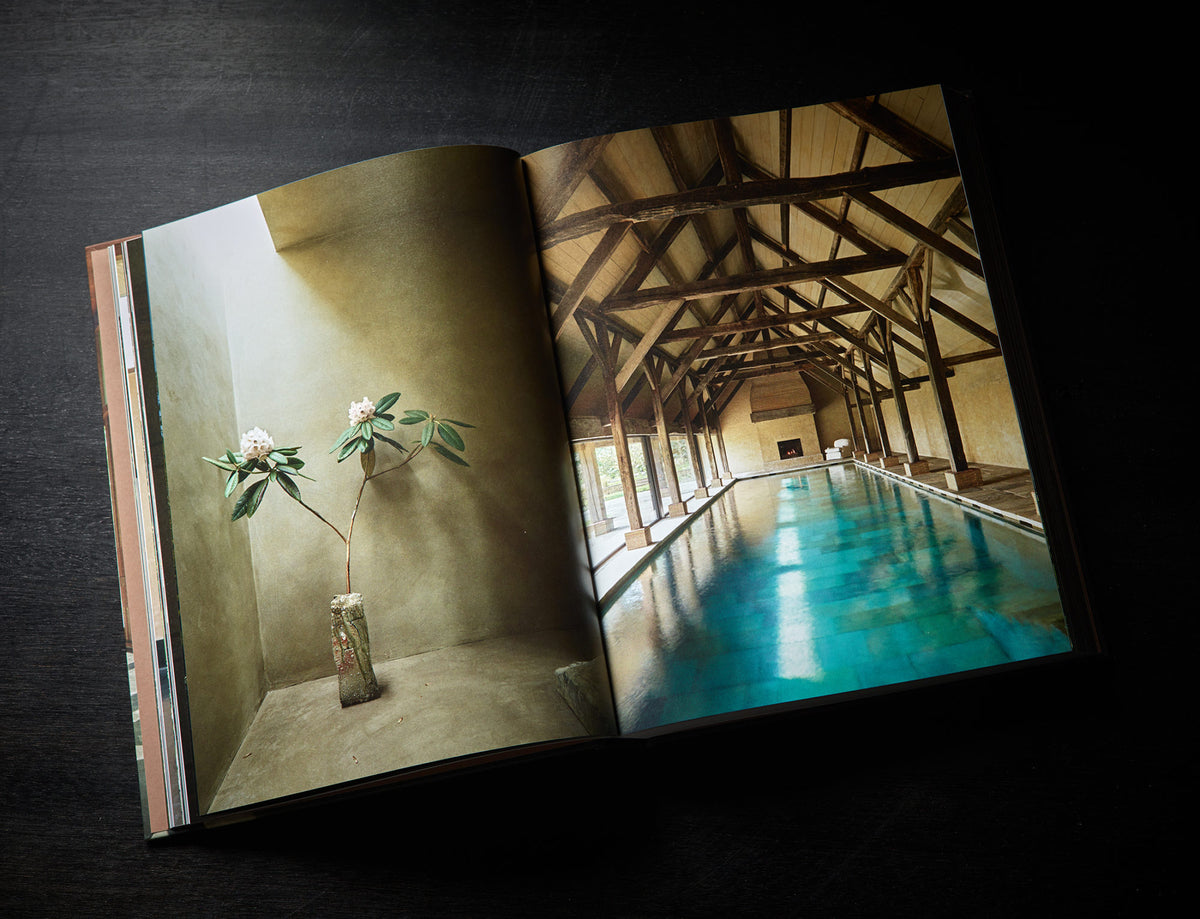 Axel Vervoordt Portraits of Interiors open spread showing an indoor pool room