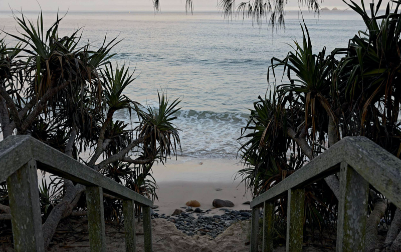 Home By The Sea stairs leading to a beach in Byron Bay.