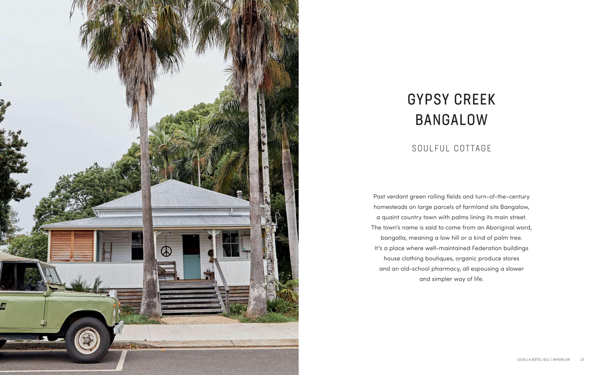 A creative community showcases a parked Home By The Sea jeep in front of a house with palm trees.
