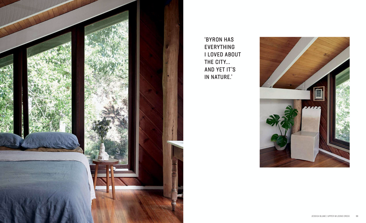 A creative community attic bedroom with a bed and a window in Byron Bay, furnished with the "Home By The Sea" by Books.