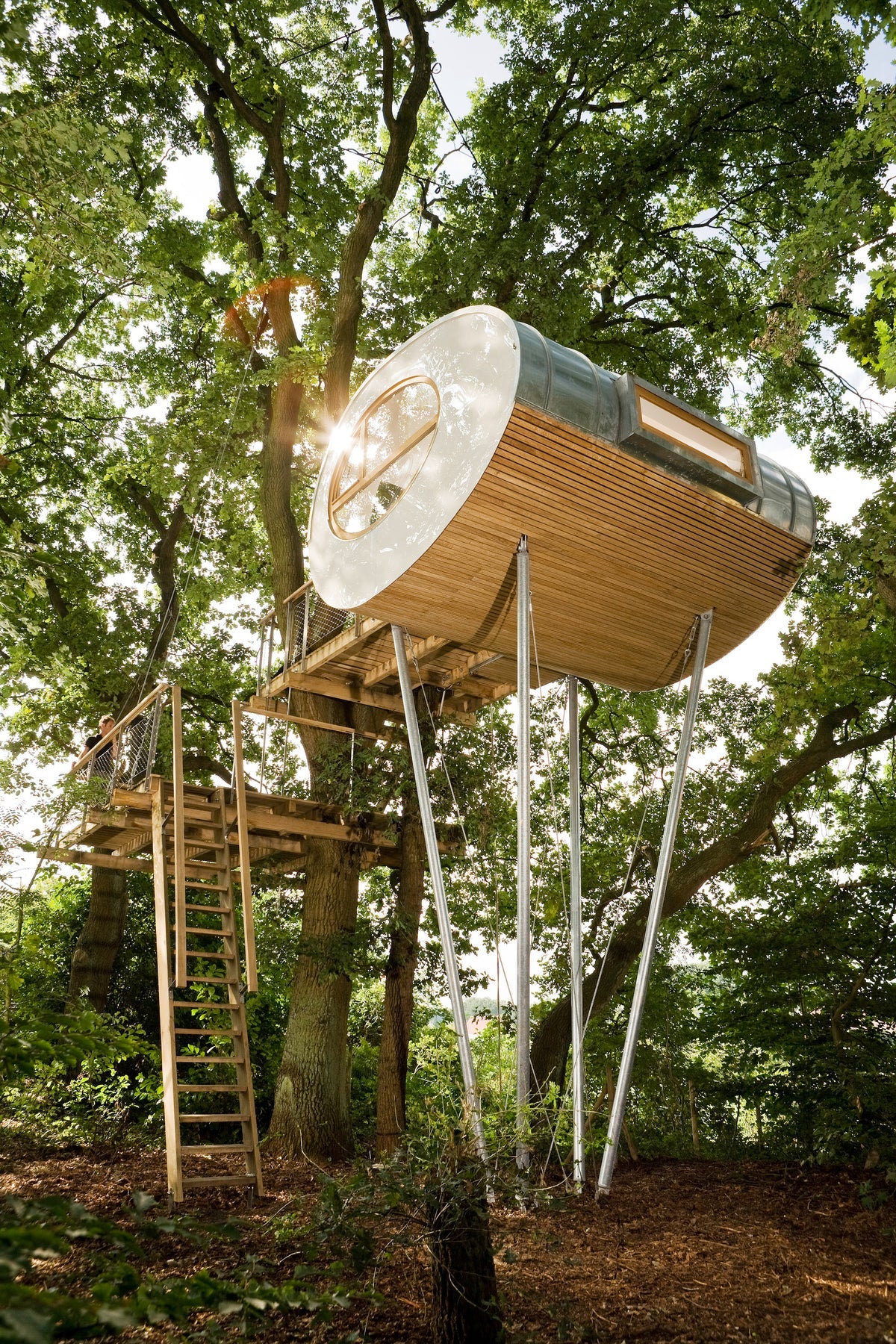 Rock the Shack page spread showing a forest tree house refuge