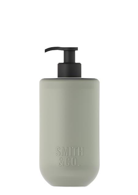 Smith & Co. Amber & Freesia hand and body wash in a sage green 400ml pump bottle on white