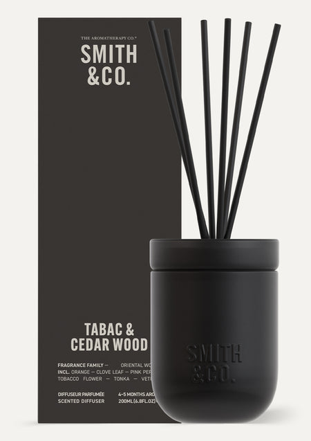 Smith & Co. Tabac & Cedarwood diffuser beside its black gift box