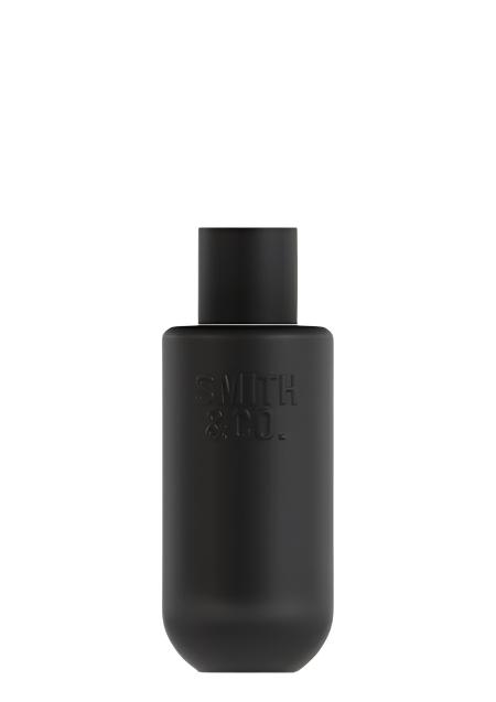 Smith and Co matte black room spray bottle on a plain white background
