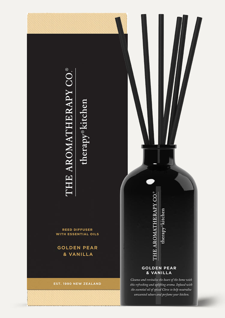 Therapy Kitchen Golden Pear & Vanilla reed diffuser beside its black and gold box