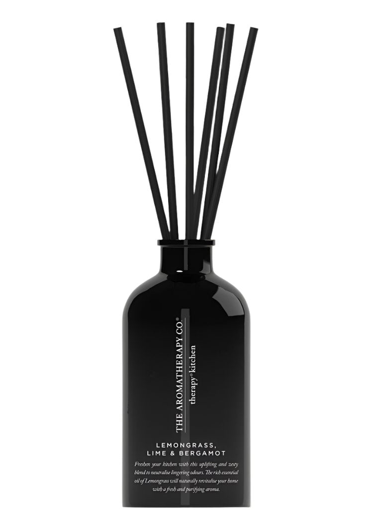 Therapy Kitchen Lemongrass, Lime & Bergamot reed diffuser in a black glass bottle with black reeds on white