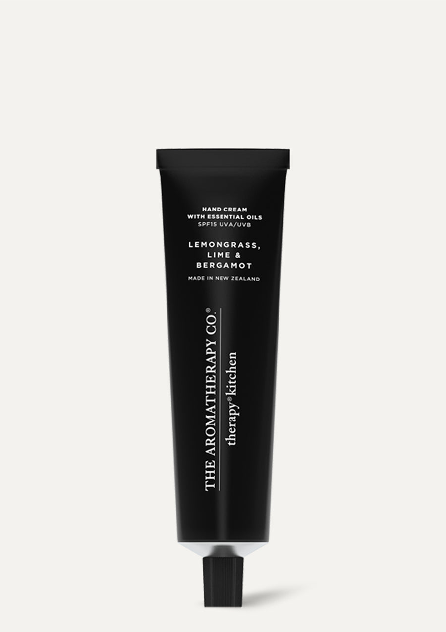 Therapy Kitchen Lemongrass, Lime & Bergamot hand cream in a black tube on a pale background