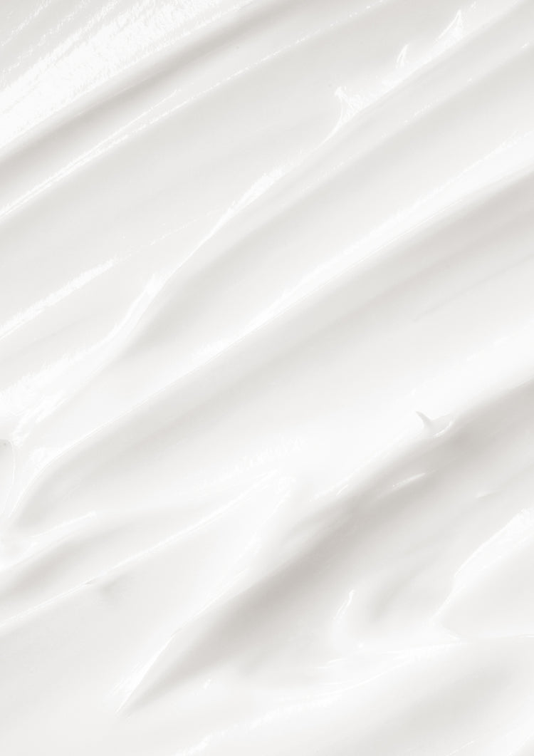 Close up of white lotion spread in streaks