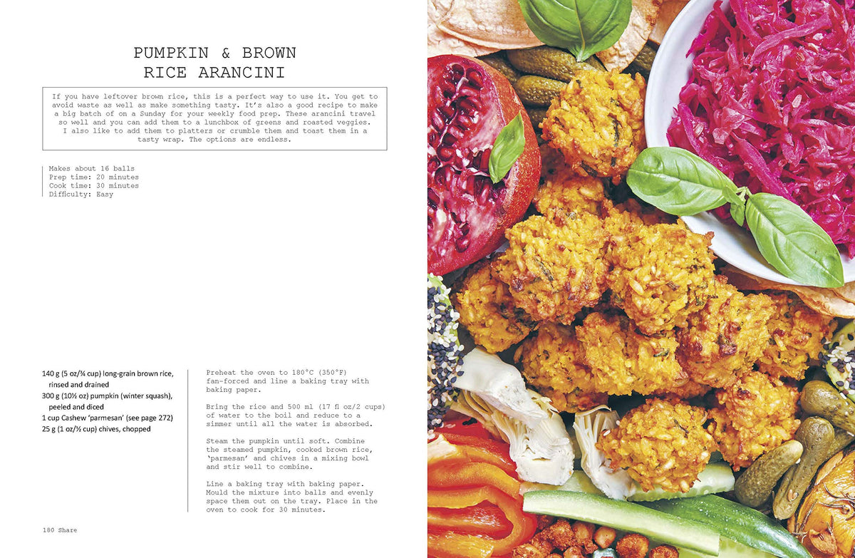 Whole cookbook spread for Pumpkin and Brown Rice Arancini on a platter with dips and vegetables
