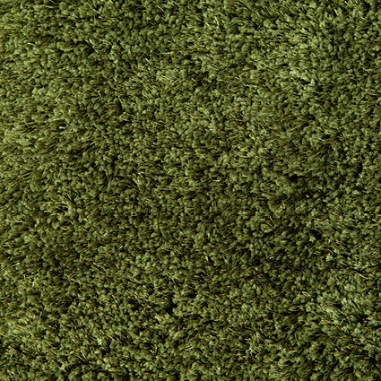 Close view of the silky olive green shaggy pile