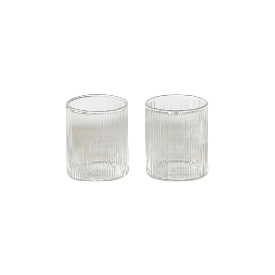 Two Amalfi fluted water glasses by Papier HQ, clear glass on a white background