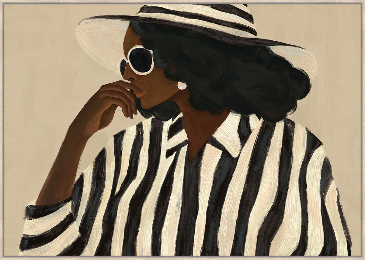 Full canvas view of black and cream stripes, a pearl earring and a hand raised to her chin on a sand background