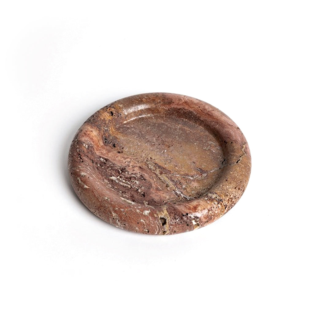 Round tray in a darker red-brown travertine on a white background