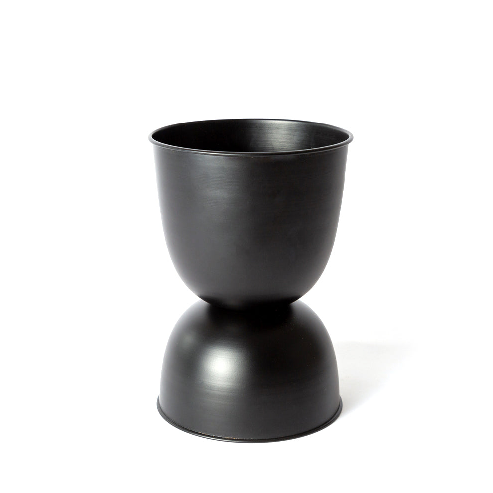 Black Domes metal planter with its rounded hourglass base on white