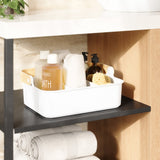 An organizing bathroom with Umbra Bellwood Storage Bins for sustainable towel and soap storage.