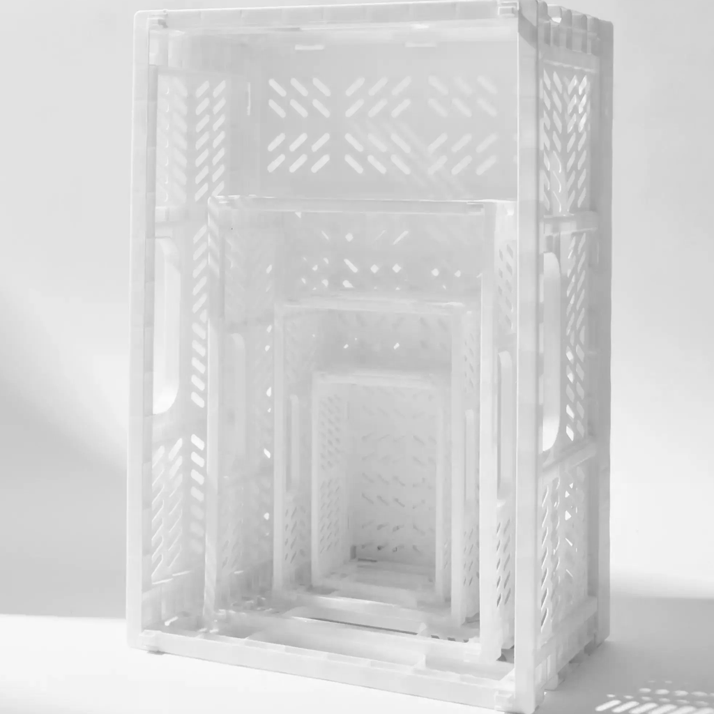 Crates in graduated sizes nested one inside another to show the range