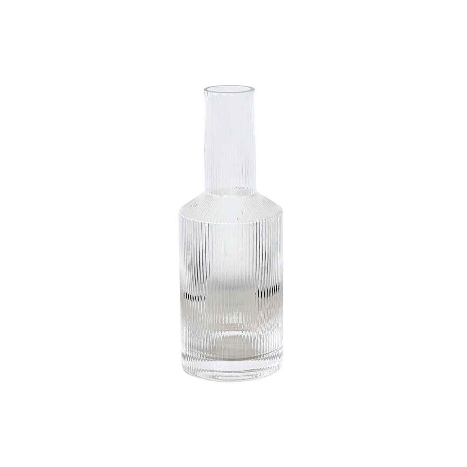 Fluted glass Amalfi water decanter styled with tumbler on white table