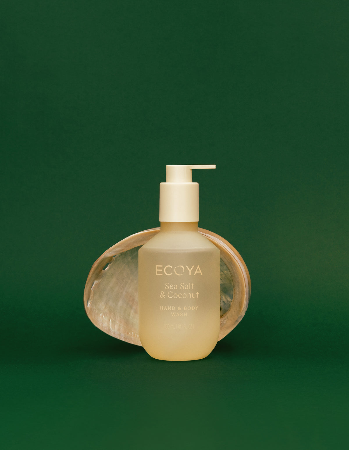 ECOYA Sea Salt & Coconut Hand & Body Wash 300ml styled with a seashell