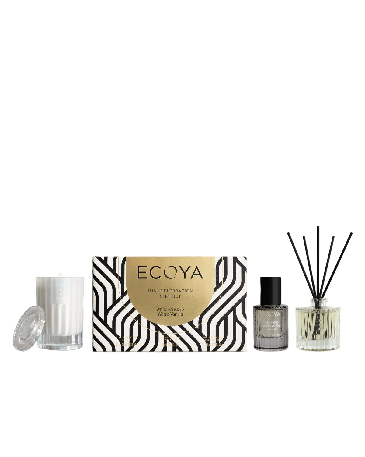 Ecoya Celebration mini gift set with cut glass candle, reed diffuser and room spray beside Art Deco box