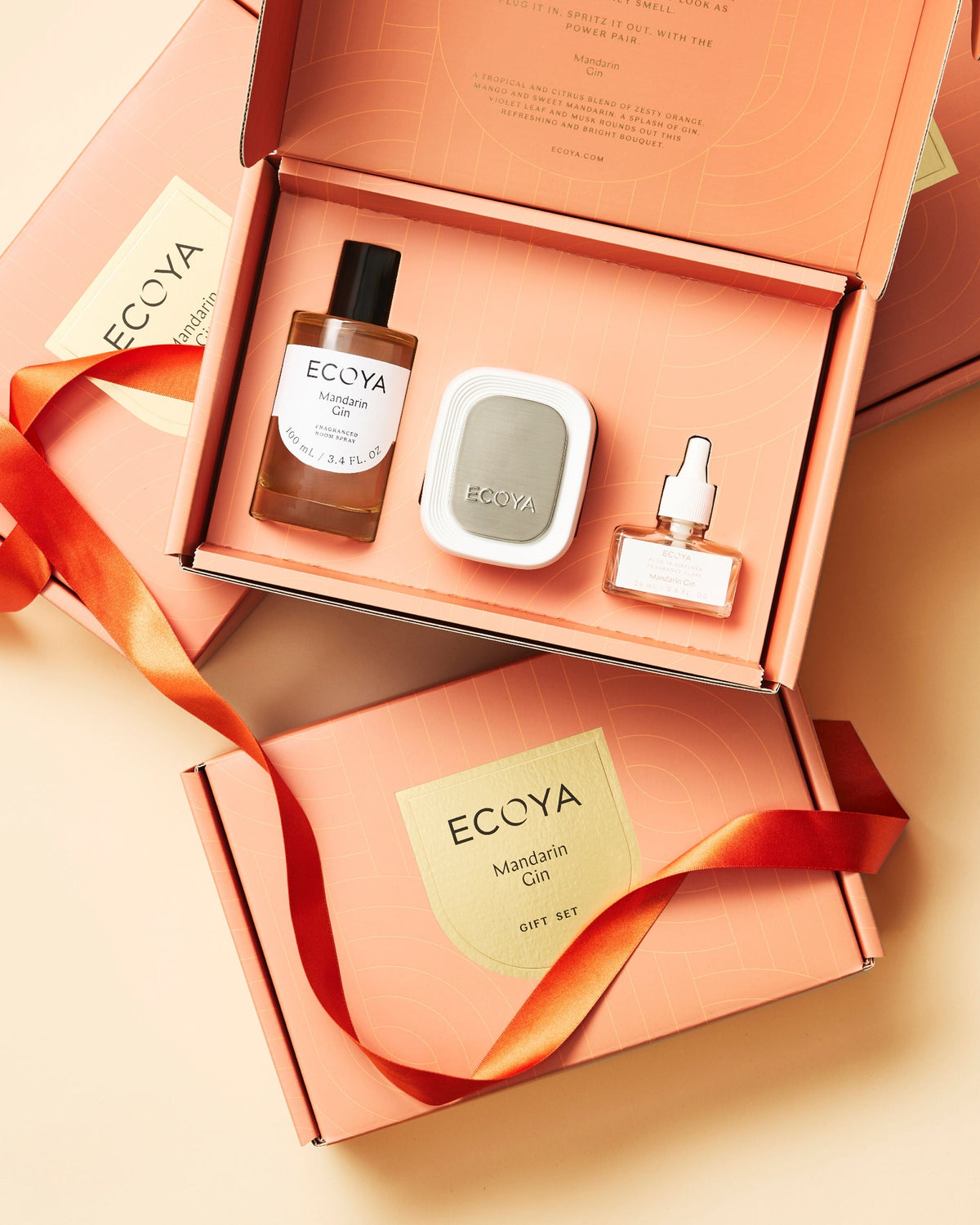 Open Ecoya Power Pair gift box in Mandarin Gin with room spray, plug-in diffuser and ribbon