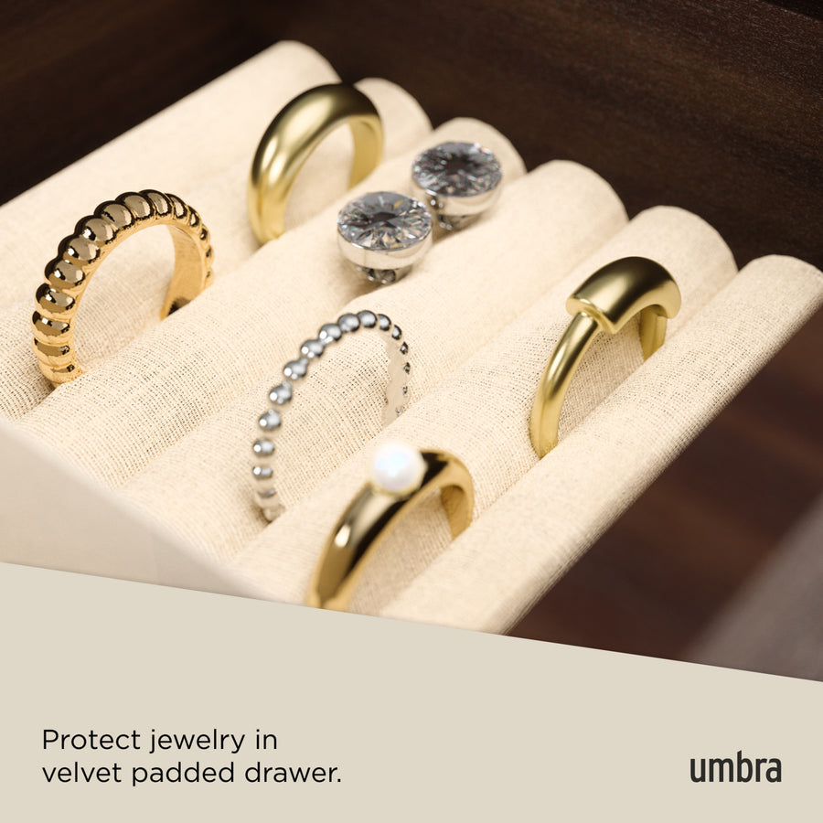 Rings stored in the velvet padded drawer of the Umbra Stowit jewellery box