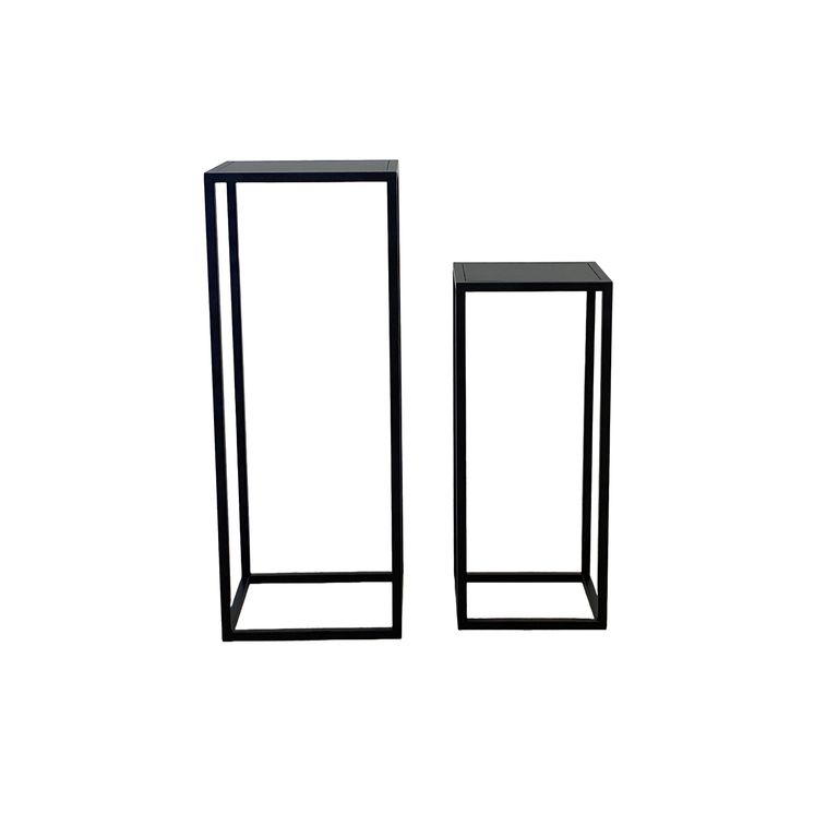 Pair of black metal plinths in two heights, open square frames photographed against white