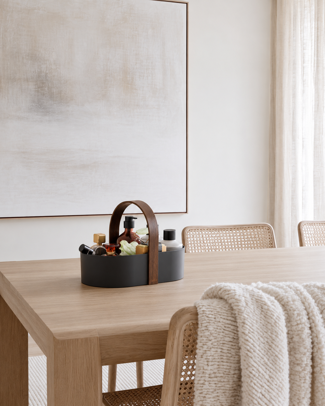 Bellwood Caddy by Umbra, Storage Organiser with Handle in Black/Walnut styled on a dining table