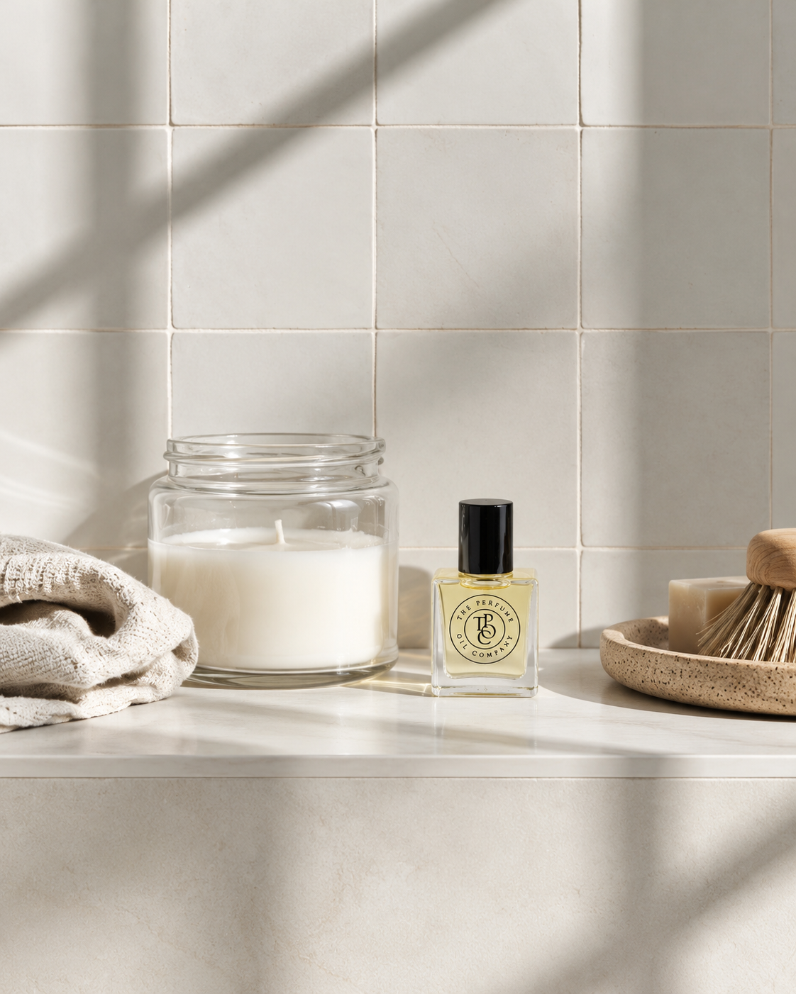 WOODLAND Perfume Oil on a stone wall ledge