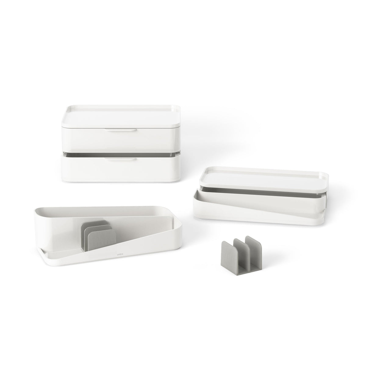 Umbra Glam large cosmetic organiser shown taken apart, trays and dividers separate