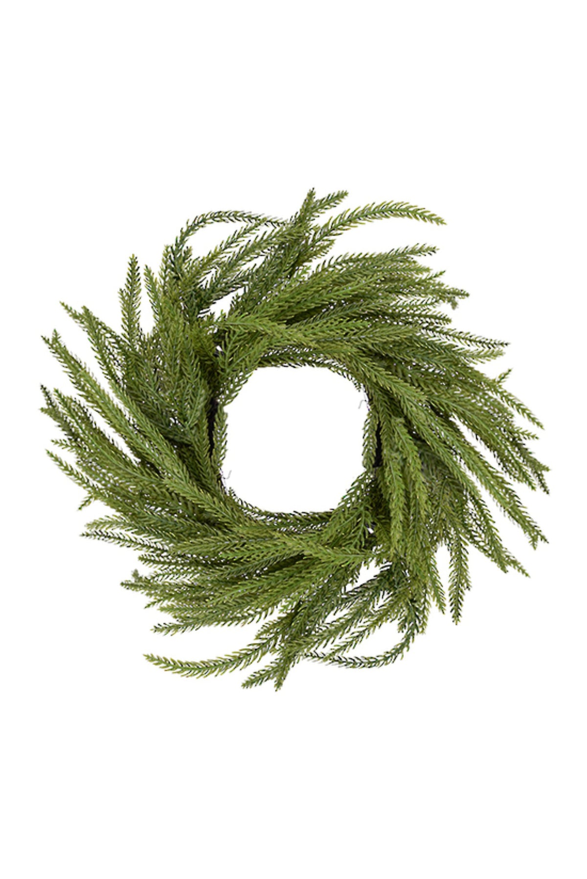 Artificial Norfolk pine candle ring around a white pillar candle on a table, 33cm