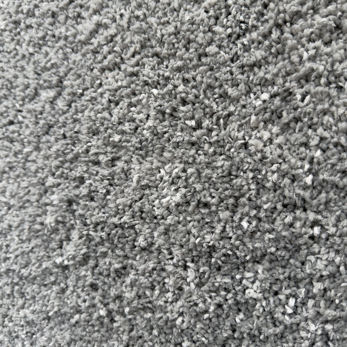 Close view of the dense concrete grey plush pile