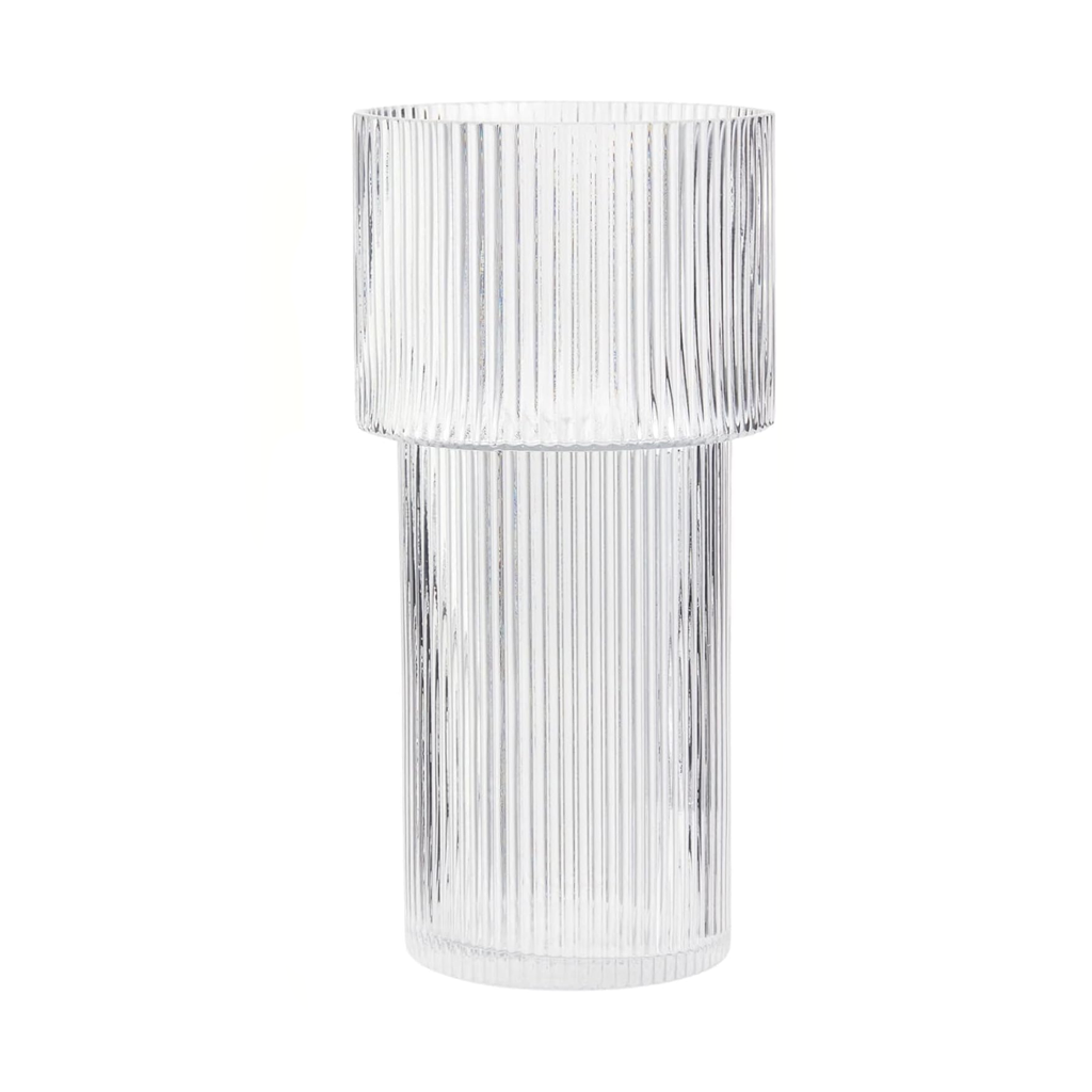 Tall ribbed clear glass vase with a stepped two-tier profile, on a plain background