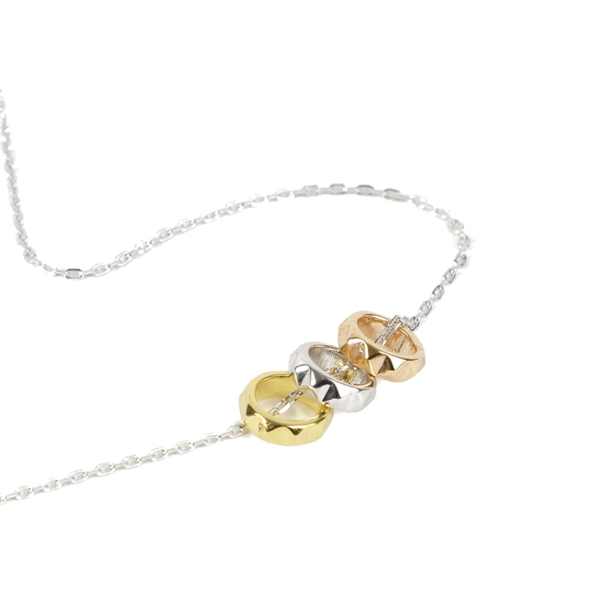 Rock Me Necklace by Federation, three small studded rings in gold, rose gold and silver on a fine chain