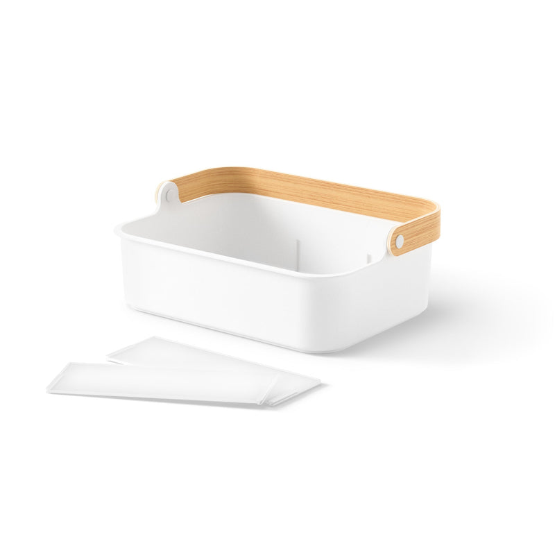 A sustainable Bellwood Storage Bin by Umbra, with a wooden lid, perfect for organizing and paired with a set of napkins.