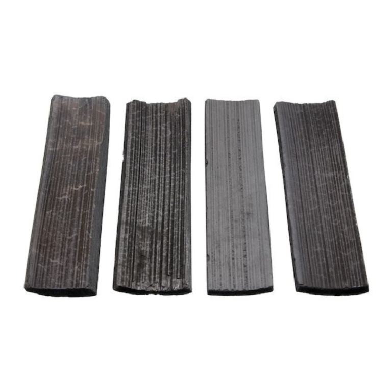 Four bamboo charcoal water filter sticks lined up on white