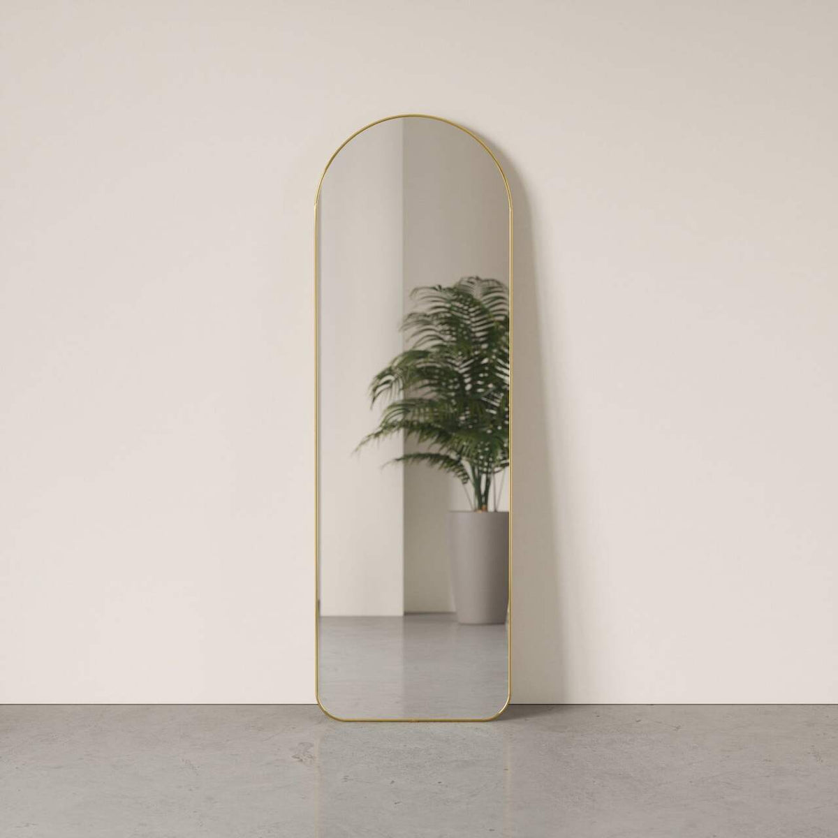 Umbra Hubba arched leaning mirror in brass, 51 x 158cm full length floor mirror