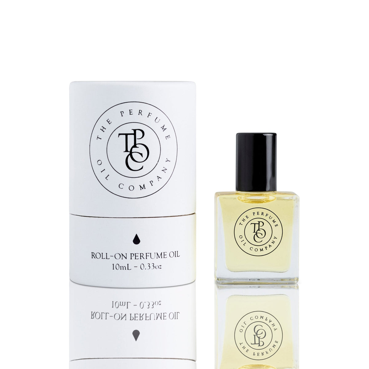 The Perfume Oil Company tube carton beside a bottle of pale yellow perfume oil