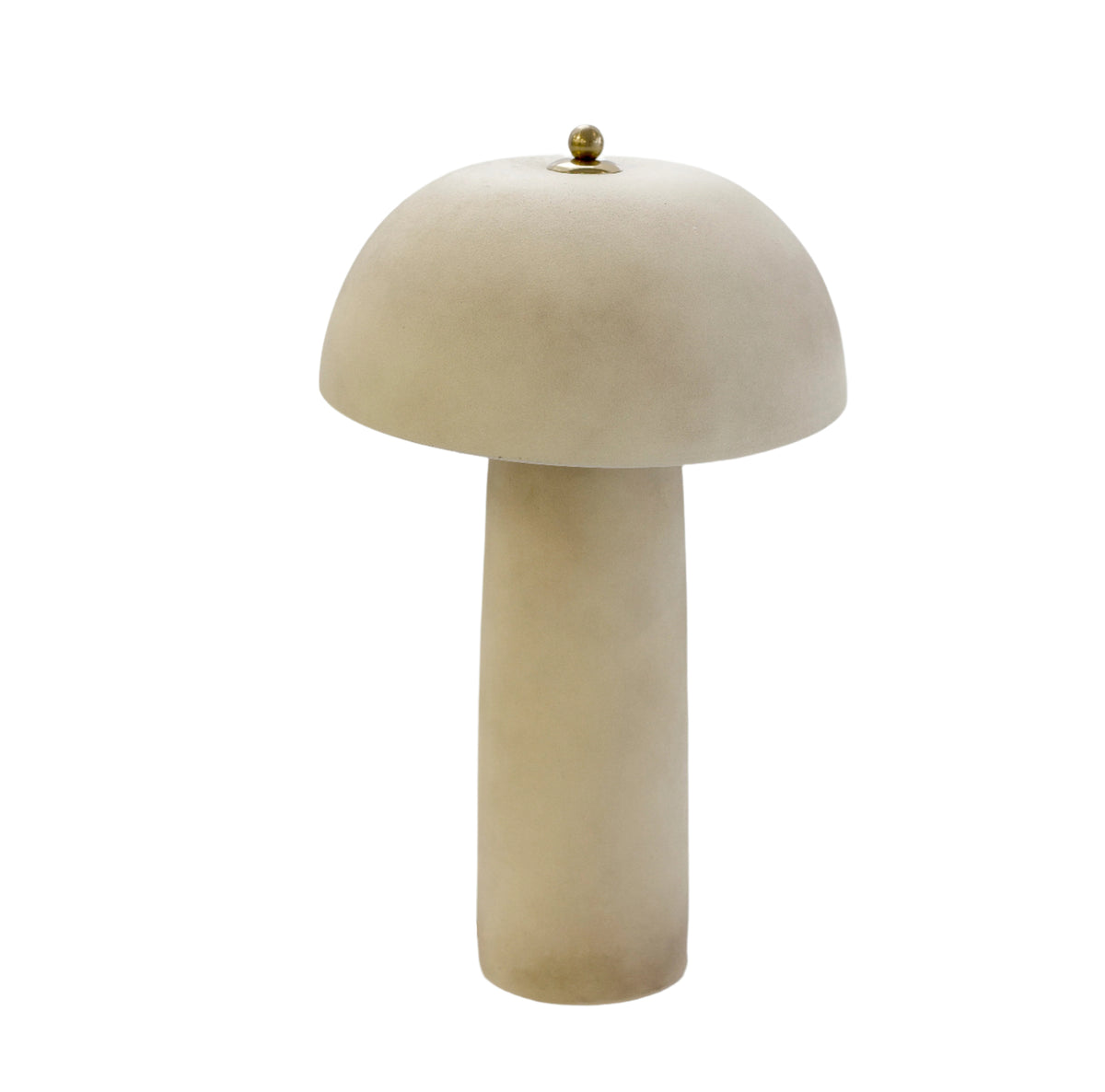 Xander table lamp in cream ceramic with a mushroom shade and brass finial, on white
