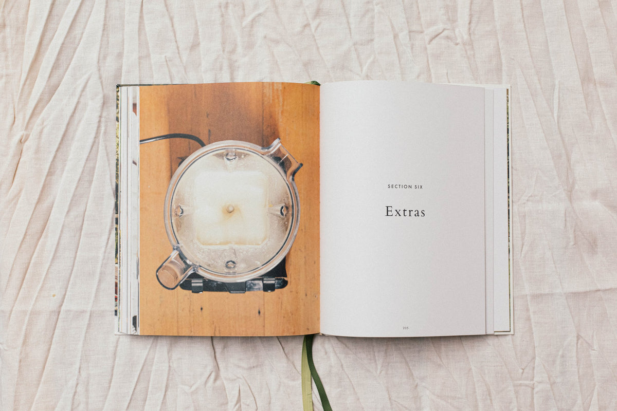 An open Salad book with a flower on it.