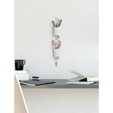 This white Floralink wall mounted holder for pens and pencils is part of the Umbra range.