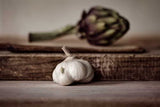 Artichoke and garlic from A Life Less Ordinary | Interiors and Inspirations, adding a touch of artistic and rustic ambiance to your interiors provided by Books.