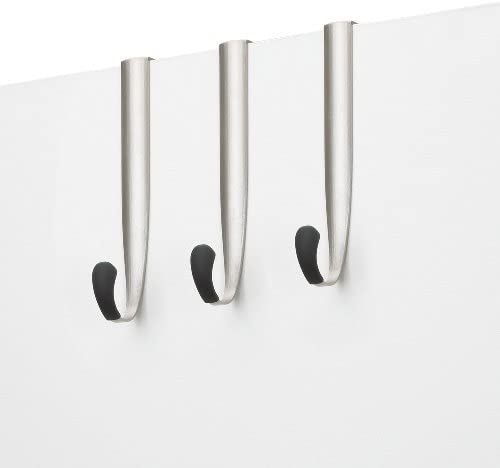 Umbra Schnook over-the-door hooks in nickel, three hooks mounted over a white door