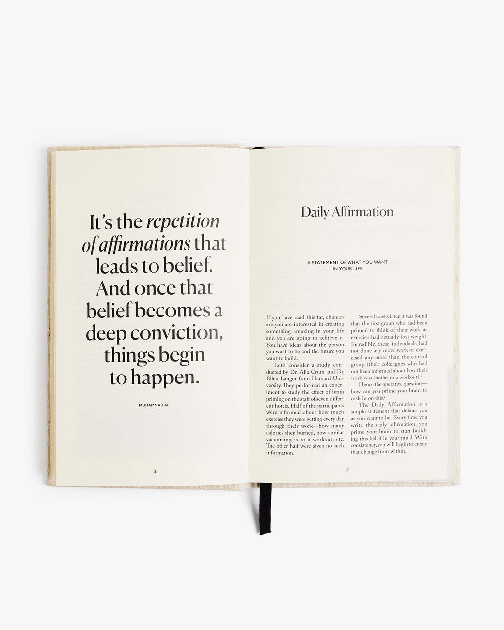 Five Minute Journal open at a printed quote about affirmations beside a daily page