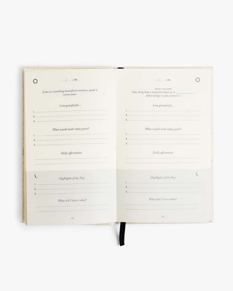 An Intelligent Change notebook with a blank page and a pen on it.