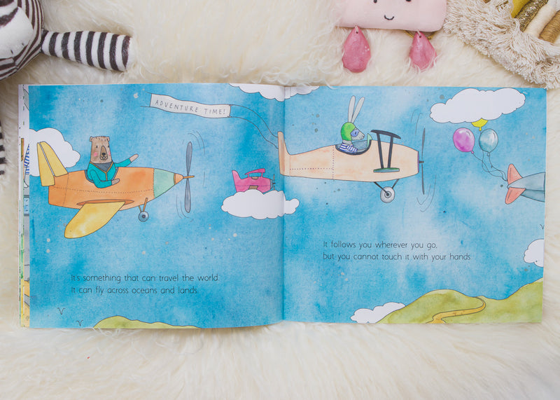 Join IN A WORLD FULL OF MAGIC on a magical adventure filled with love and airplanes in this enchanting children's book by Olive + Page.
