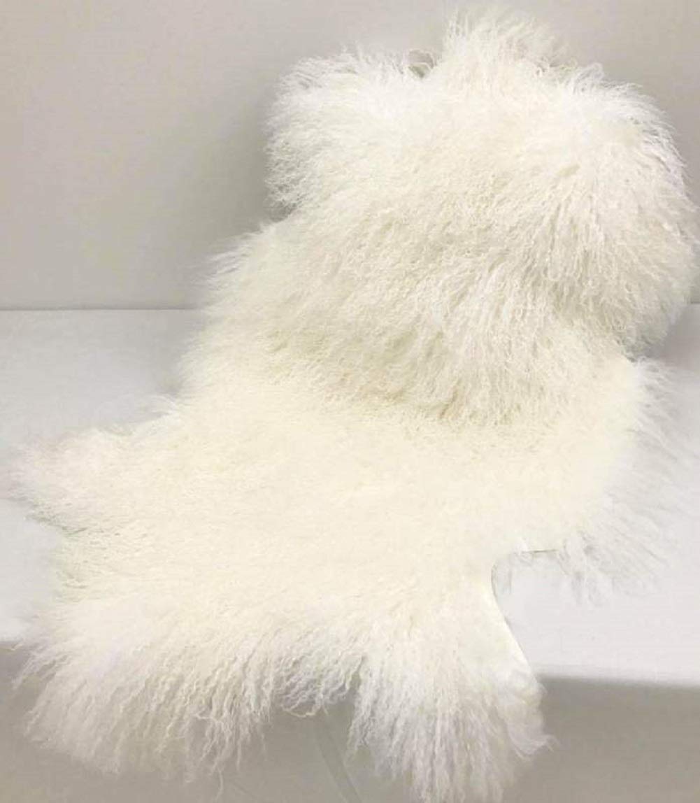 White Tibetan lamb fur double rug laid out flat showing its natural hide shape