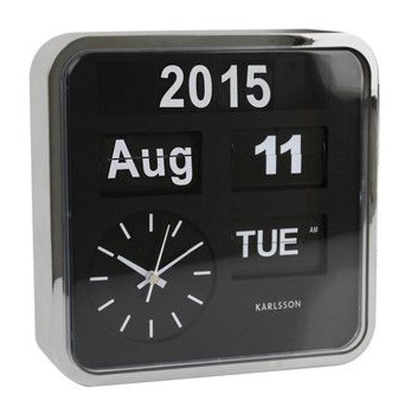 Karlsson Big Flip calendar clock angled view showing case depth and flip calendar cards