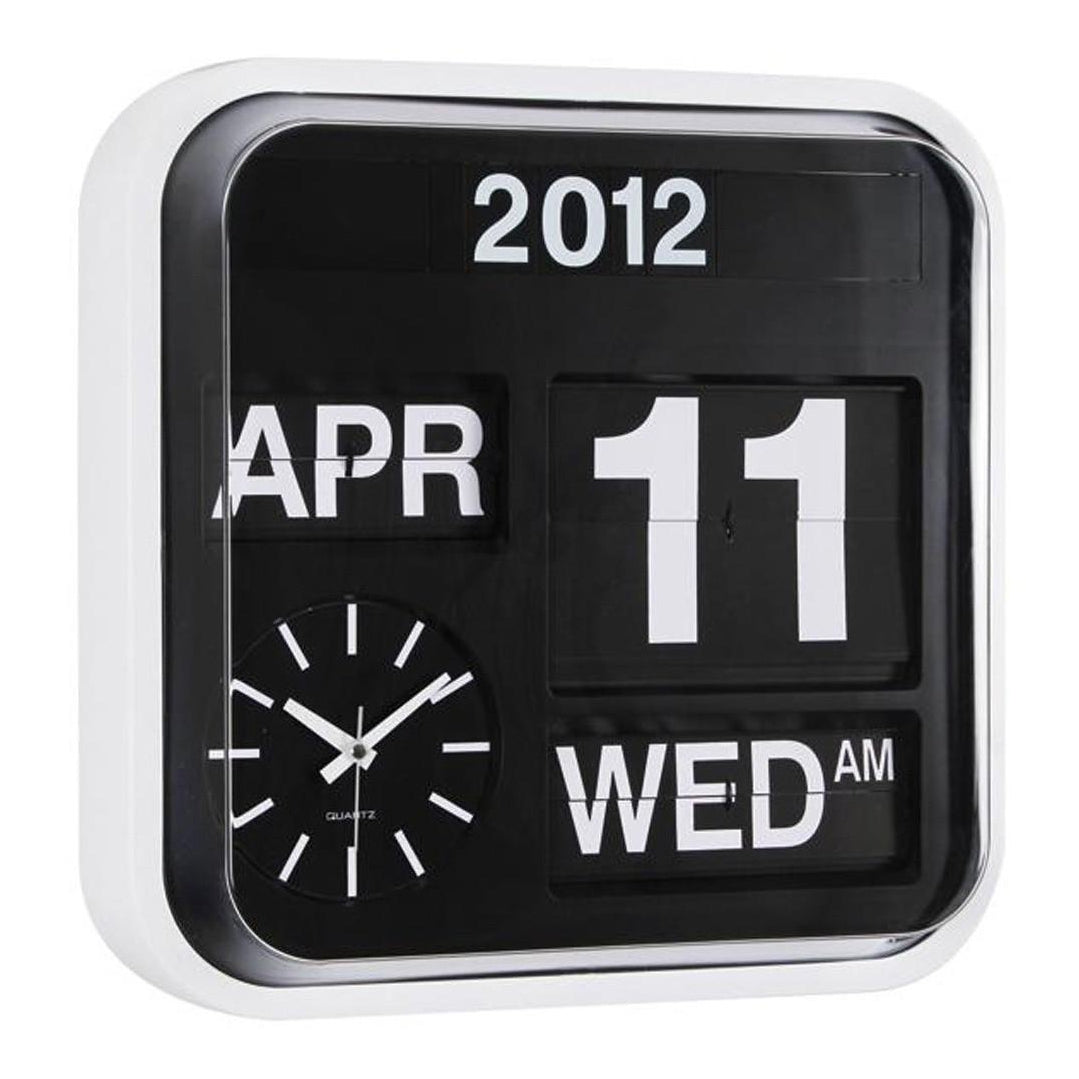 Karlsson Big Flip calendar clock front view, analogue face above flip day and date cards