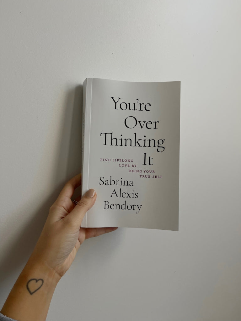 Hand holding the book