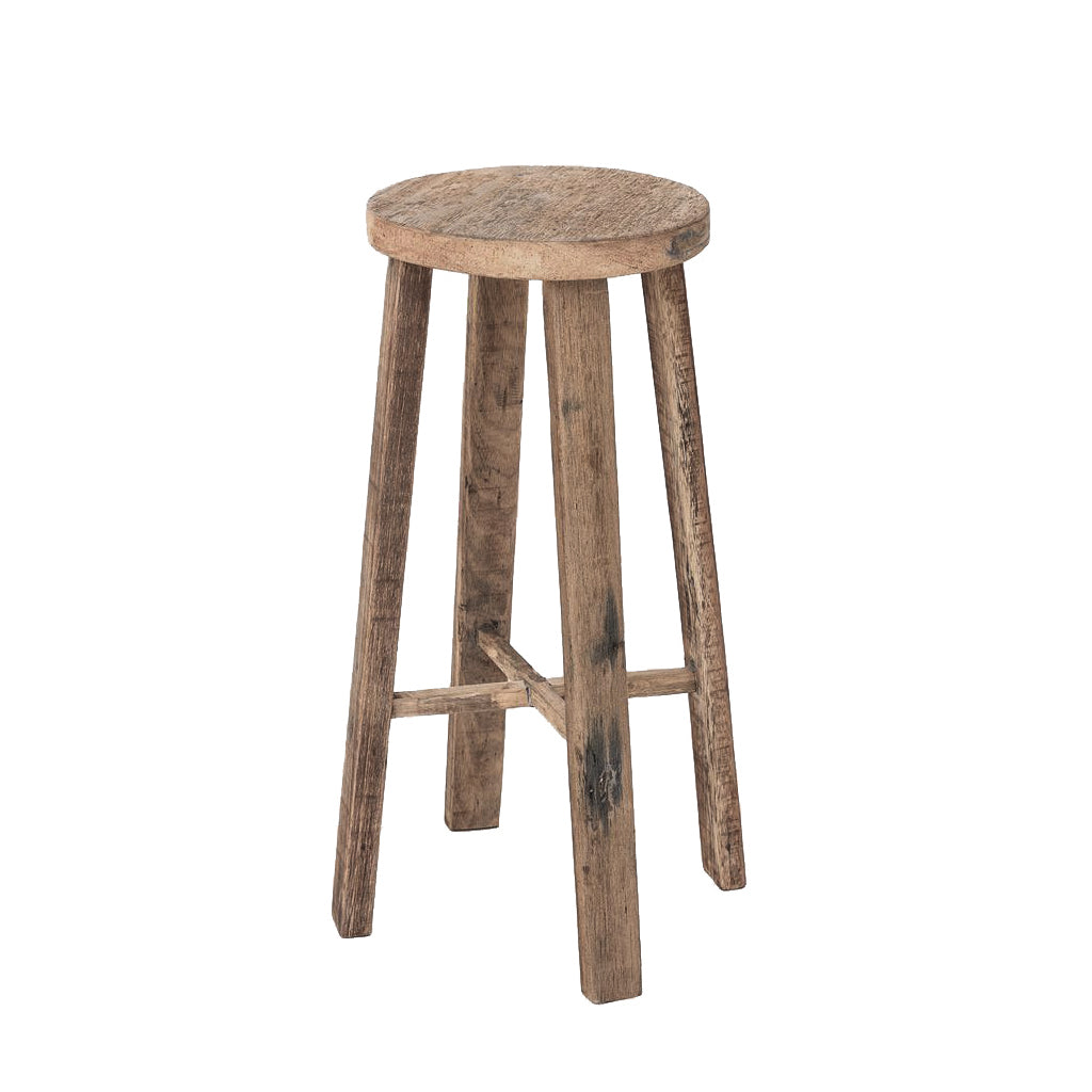 Rustic recycled teak bar stool with a round seat and four splayed legs braced by cross stretchers, on white